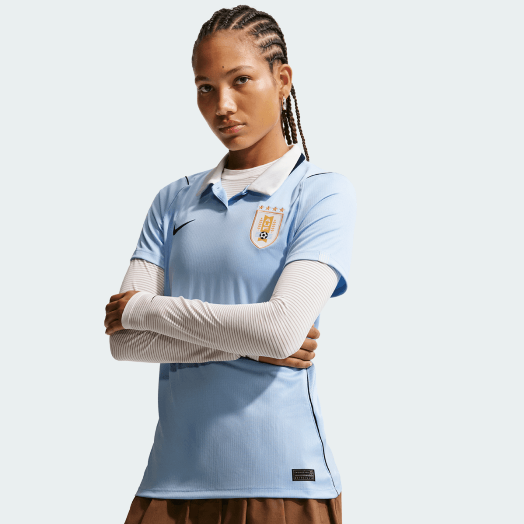 90_89f834aa-4ae8-455d-a47c-a2a0aa652ff4 Camisa Feminina Uruguai 2026/27 I - Image 1