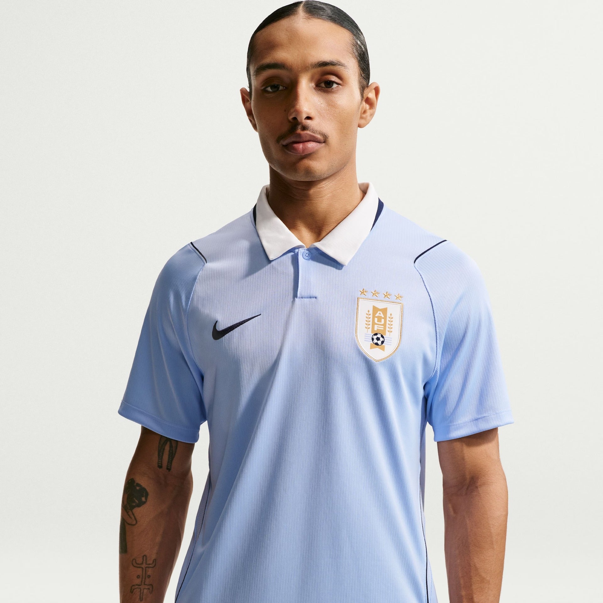 download-2026-03-24T212847.501_e31acb03-0141-42c3-8d78-14d85682fcde Camisa Uruguai 2026/27 I - Image 1
